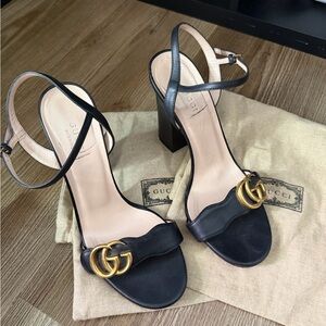 Gucci Black Heels with Gold Logo Detail